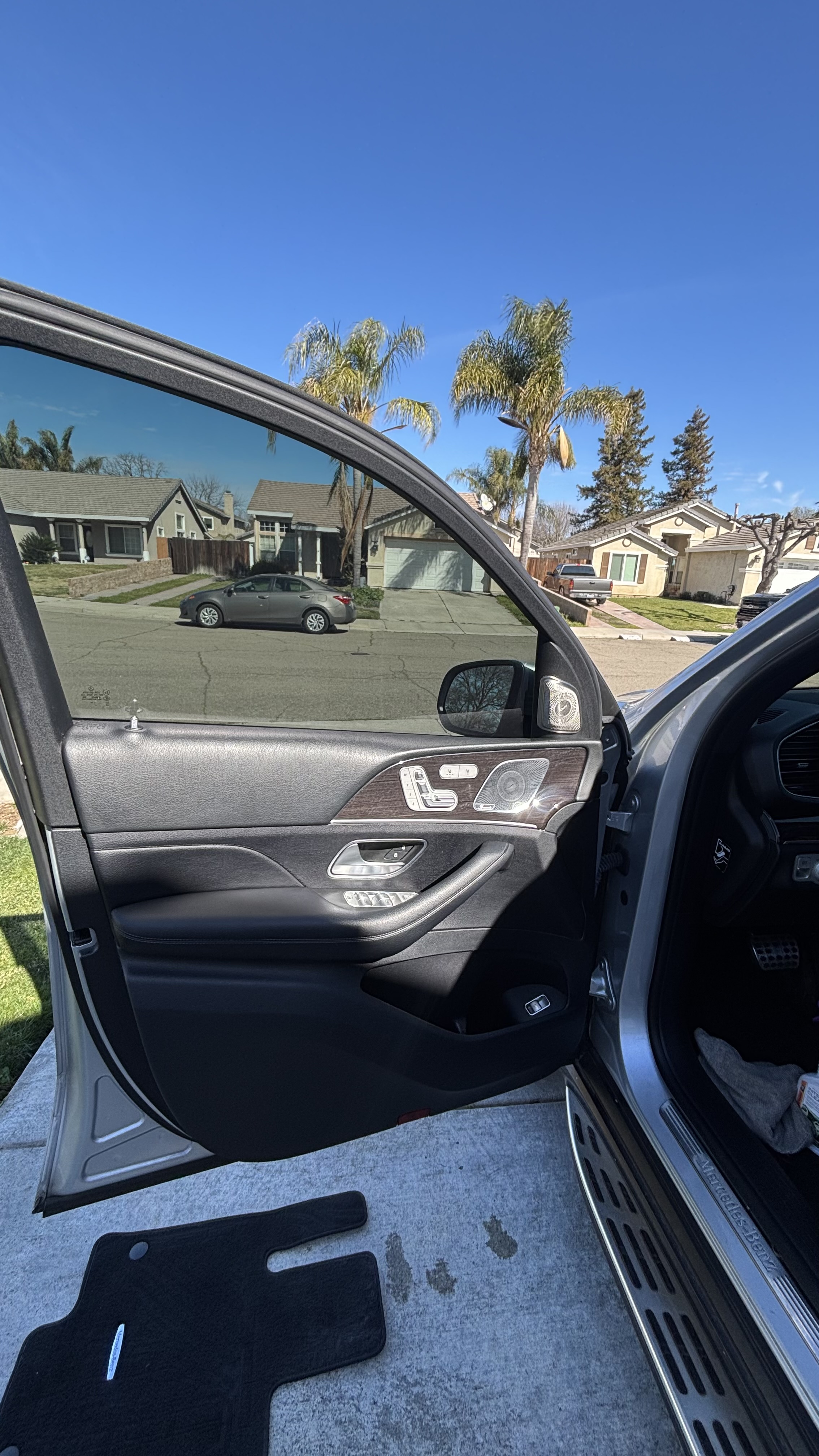 Mercedes-Benz GLE rear door panel with wood trim, cleaned and conditioned
